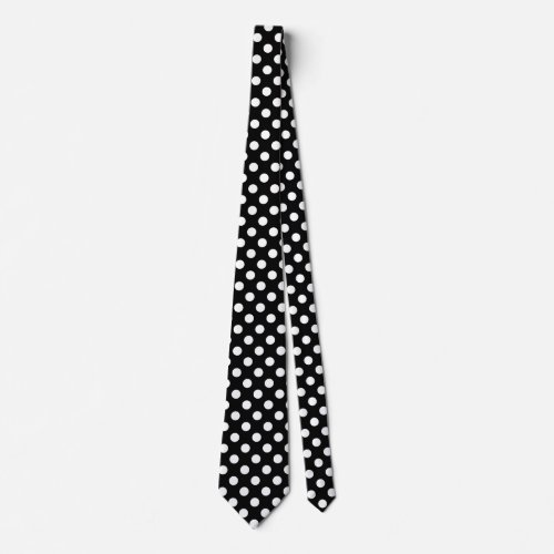 White polka dots on black neck tie