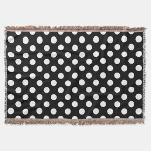 White polka dots on black throw blanket