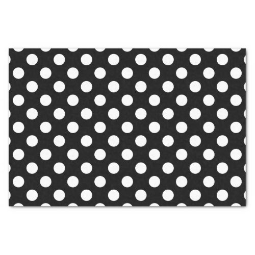 White polka dots on black tissue paper