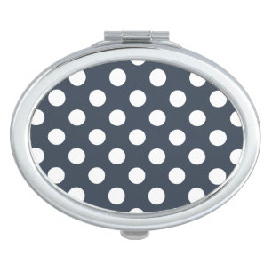 White polka dots on blue-gray compact mirror
