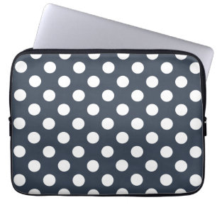 White polka dots on blue-gray laptop sleeve