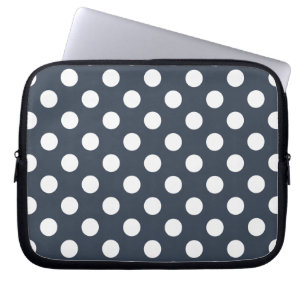 White polka dots on blue-gray laptop sleeve