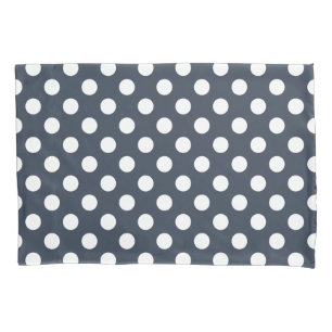 White polka dots on blue-gray pillowcase