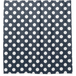 White polka dots on blue-gray shower curtain