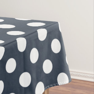 White polka dots on blue-gray tablecloth