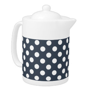 White polka dots on blue-gray teapot