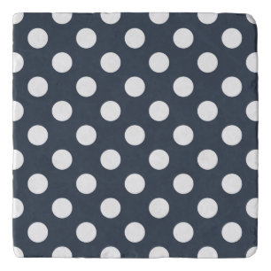 White polka dots on blue-gray trivet