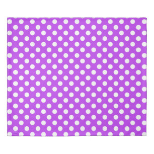 White polka dots on bright purple duvet cover