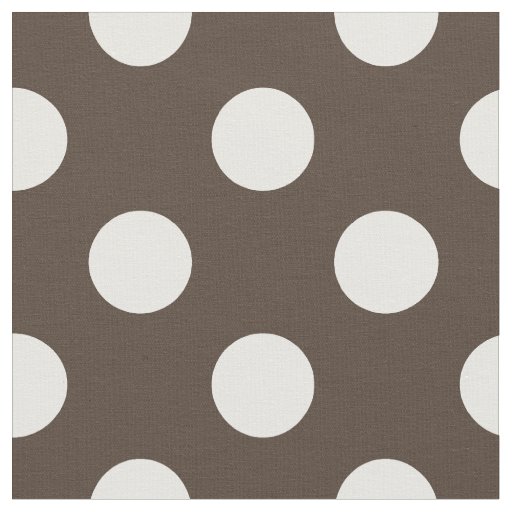 White polka dots on brown fabric