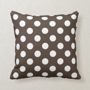 White polka dots on brown throw pillow