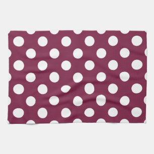 White polka dots on burgundy kitchen towel