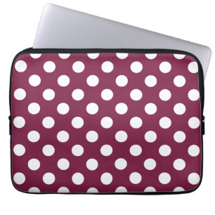 White polka dots on burgundy laptop sleeve