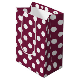 White polka dots on burgundy medium gift bag