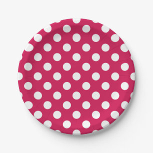 White polka dots on cerise paper plates
