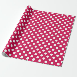 White polka dots on cerise wrapping paper