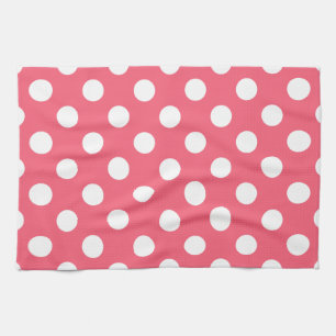 White polka dots on coral towel