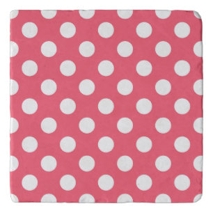 White polka dots on coral trivet