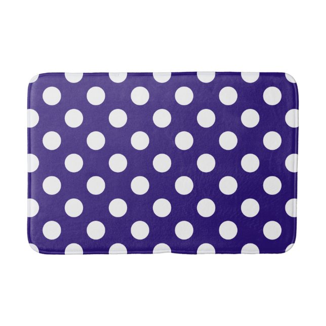 White polka dots on dark blue bathroom mat (Front)