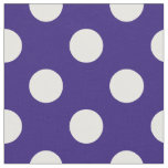 White polka dots on dark blue fabric