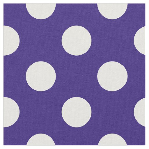 White polka dots on dark blue fabric