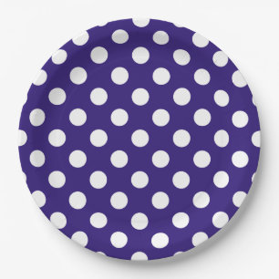 White polka dots on dark blue paper plates