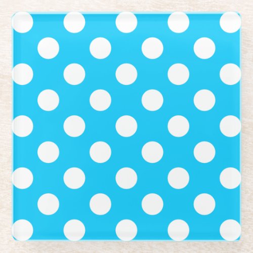 White polka dots on electric blue glass coaster