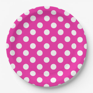 White polka dots on fuchsia paper plates