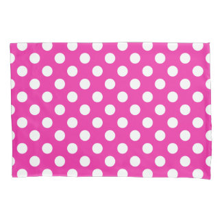 White polka dots on fuchsia pillow case