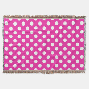 White polka dots on fuchsia throw blanket