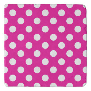 White polka dots on fuchsia trivet