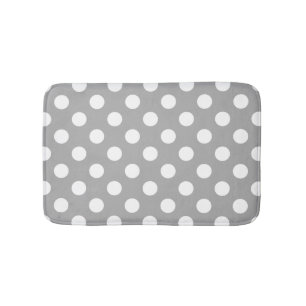 White polka dots on grey bathroom mat
