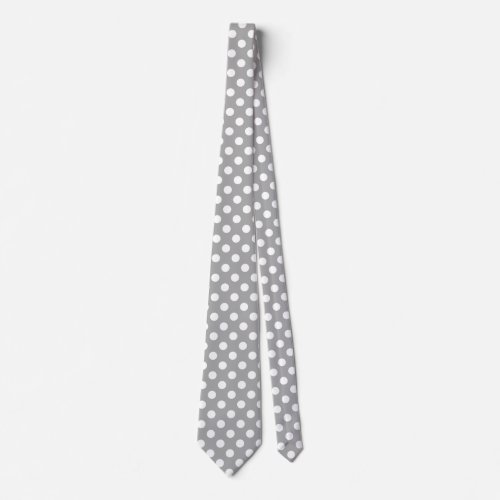 White polka dots on grey tie