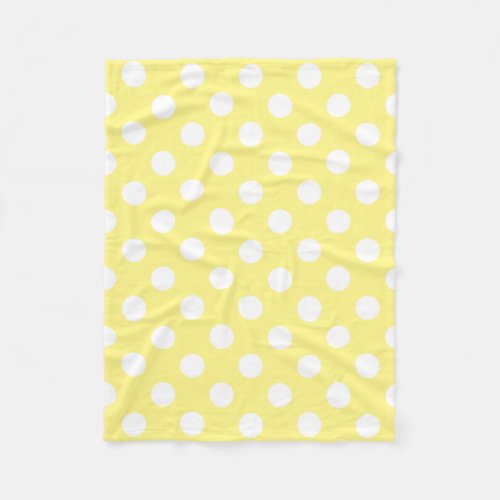 White polka dots on lemon yellow fleece blanket