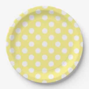 White polka dots on lemon yellow paper plates