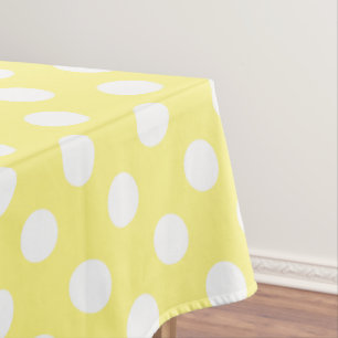 White polka dots on lemon yellow tablecloth