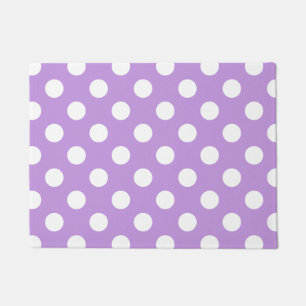 White polka dots on lilac doormat