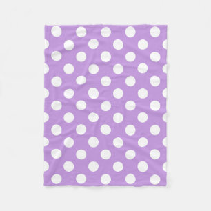 White polka dots on lilac fleece blanket
