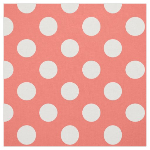 coral and white polka dot fabric