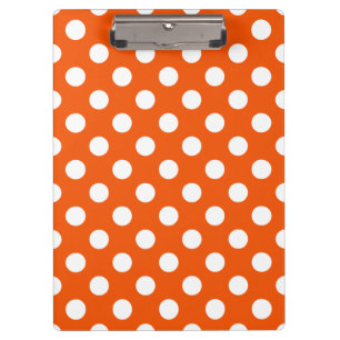 White polka dots on orange clipboard