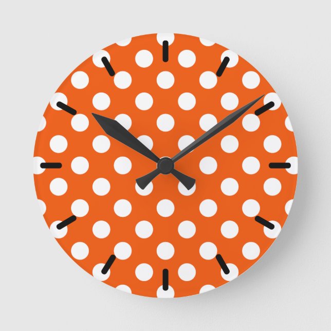 White polka dots on orange round clock (Front)