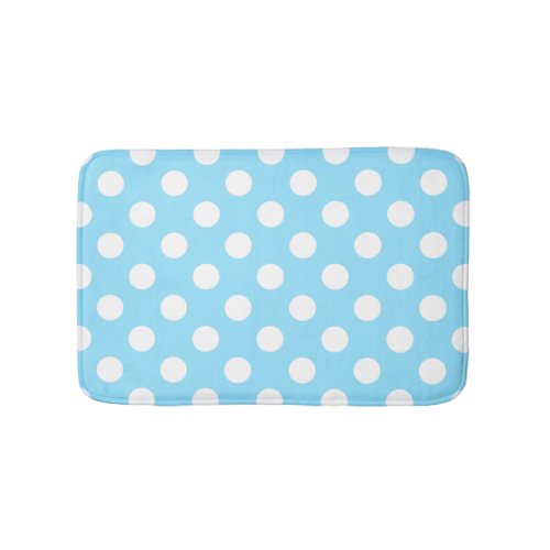 White polka dots on pale blue bath mat