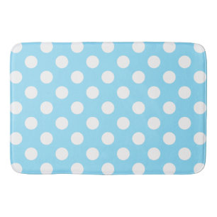 White polka dots on pale blue bathroom mat