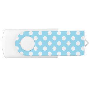 White polka dots on pale blue flash drive