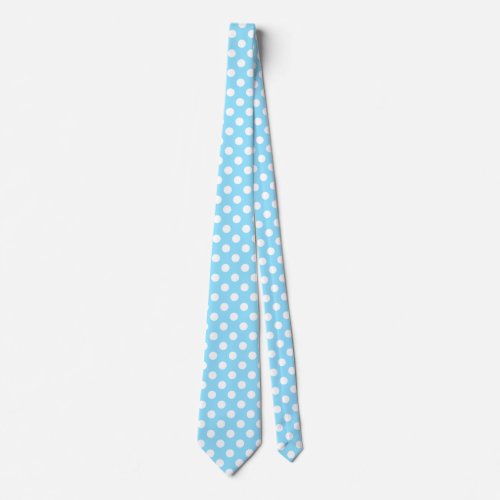 White polka dots on pale blue neck tie