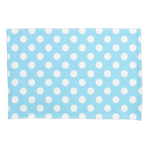 White polka dots on pale blue pillowcase
