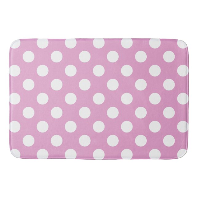 White polka dots on pale pink bathroom mat (Front)