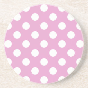 White polka dots on pale pink drink coaster