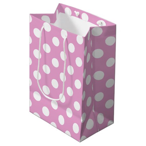 White polka dots on pale pink medium gift bag