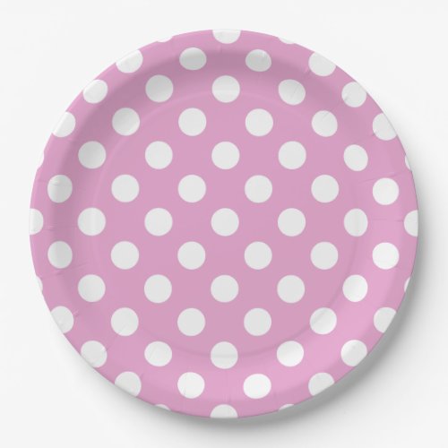 White polka dots on pale pink paper plates