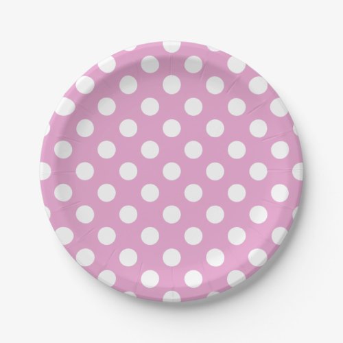 White polka dots on pale pink paper plates